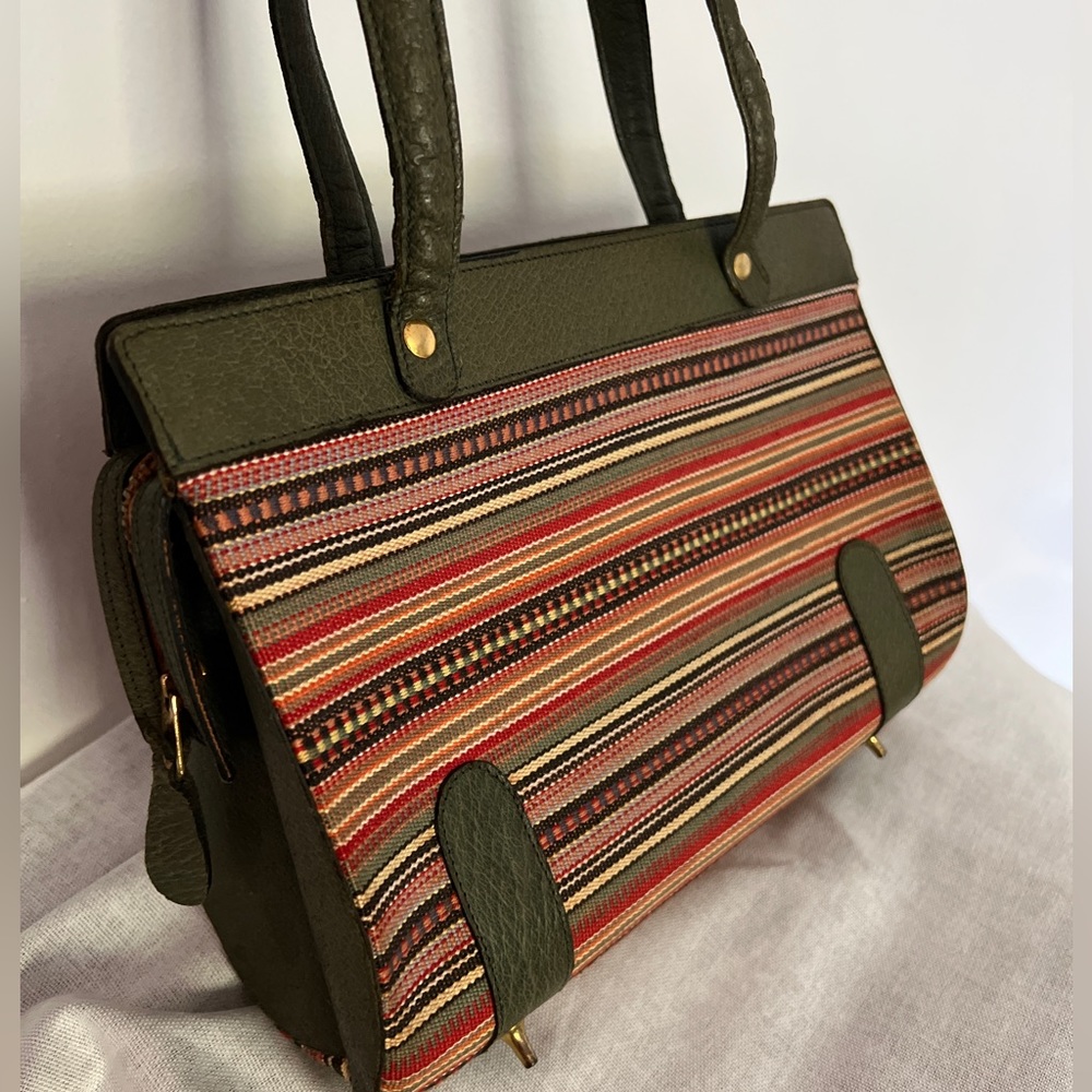 Detailed threaded purse with green, red, yellow, organ ge and black threading